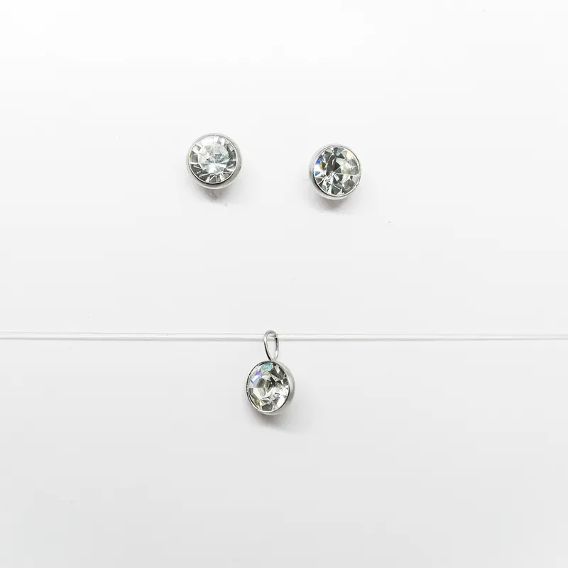 CONJ INOX CRAVACAO INGLESASTRASS 8MM CRISTAL